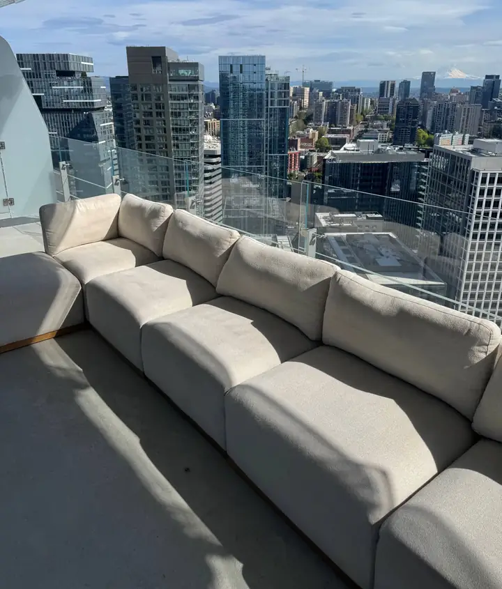 Freshly cleaned cream sectional on a downtown Seattle terrace